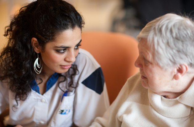 Stockfoto zorgmedewerker en cliënt